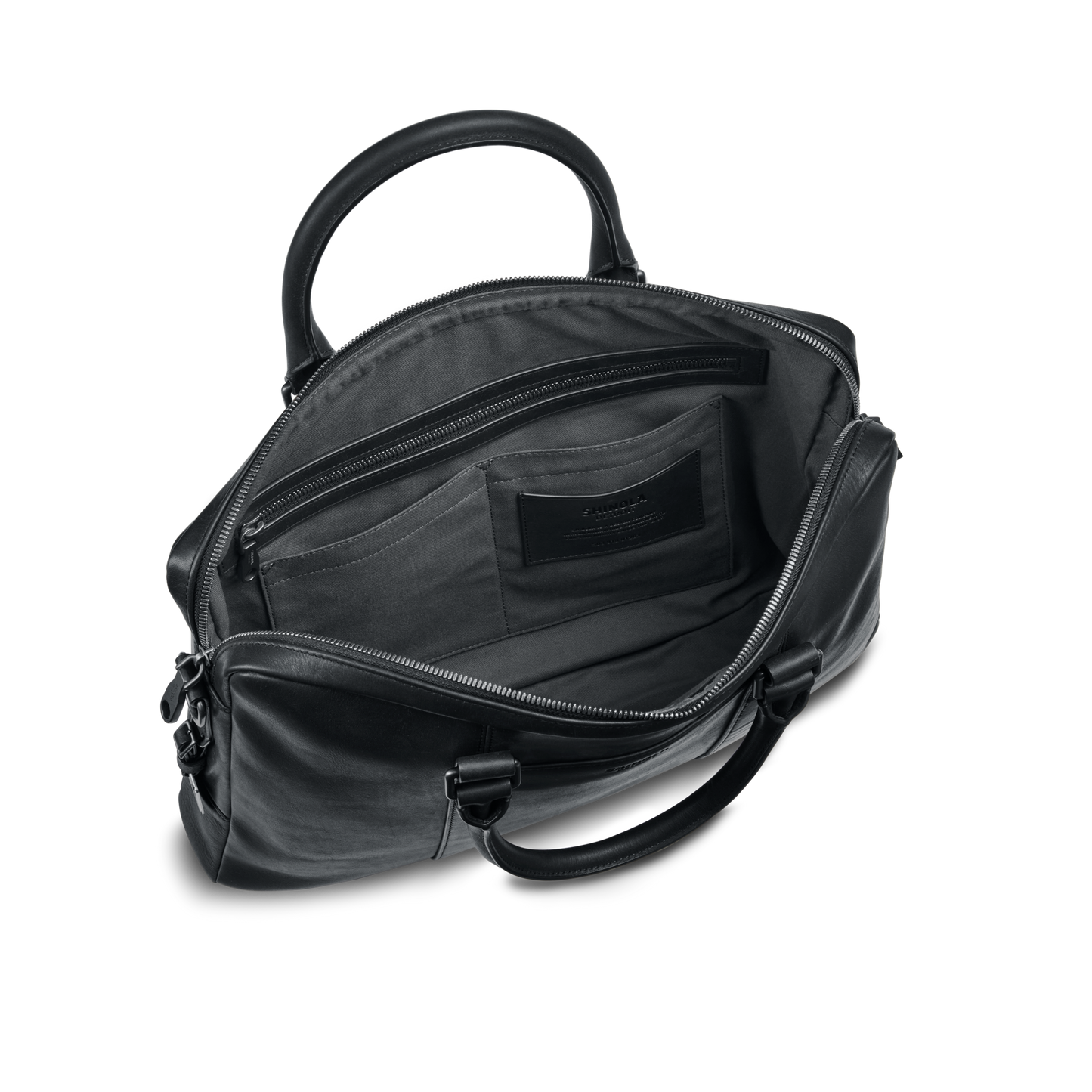 The nicelaundry-jp.computer Briefcase - Black is shown open, displaying its spacious interior with multiple pockets. Featuring silver zippers, two sturdy handles, and a sleek modern design, it’s ideal as a stylish work bag.