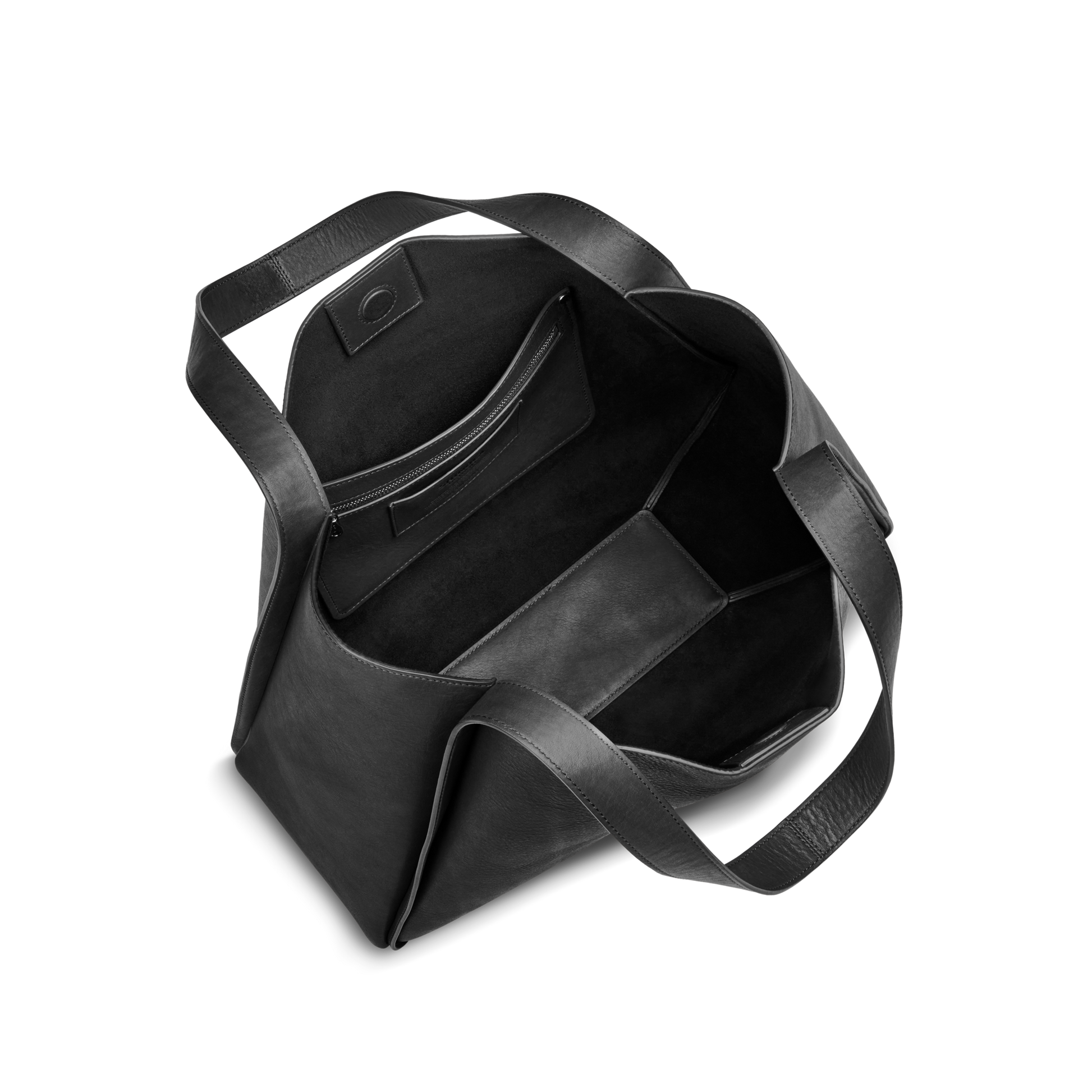 The Shinola Derby Tote Bag - Black features two handles, a spacious main compartment, and an inner pocket. Its dark-lined interior brings elegance, making it the ideal everyday tote in natural black leather.