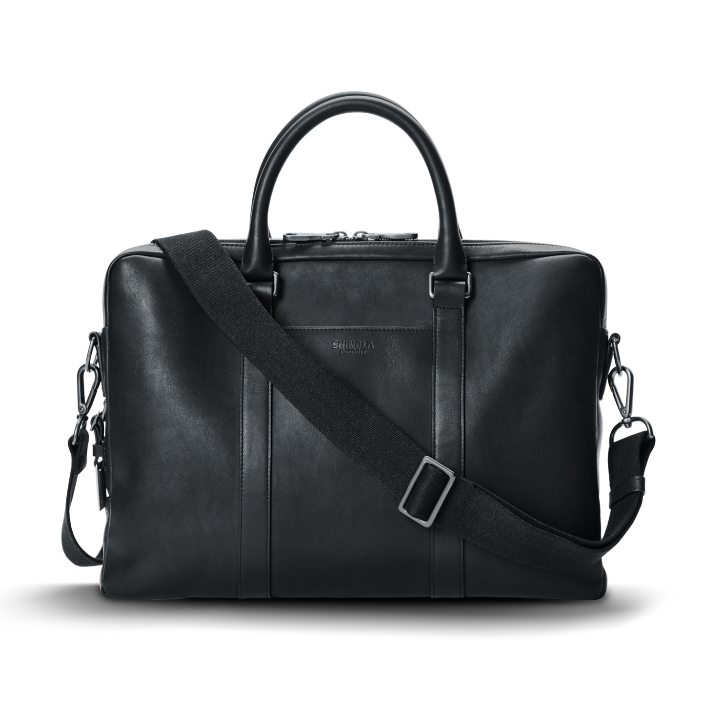 The nicelaundry-jp.computer Briefcase - Black is a sleek leather work bag with double top handles, a detachable shoulder strap, minimal metallic hardware, and subtle front branding, shown against a plain white background.