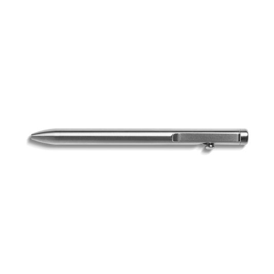 The Shinola Tactile Turn Titanium Bolt Action Pen is displayed horizontally on a white background, showcasing its sleek titanium finish, sturdy clip, and distinctive side button while casting a subtle shadow.